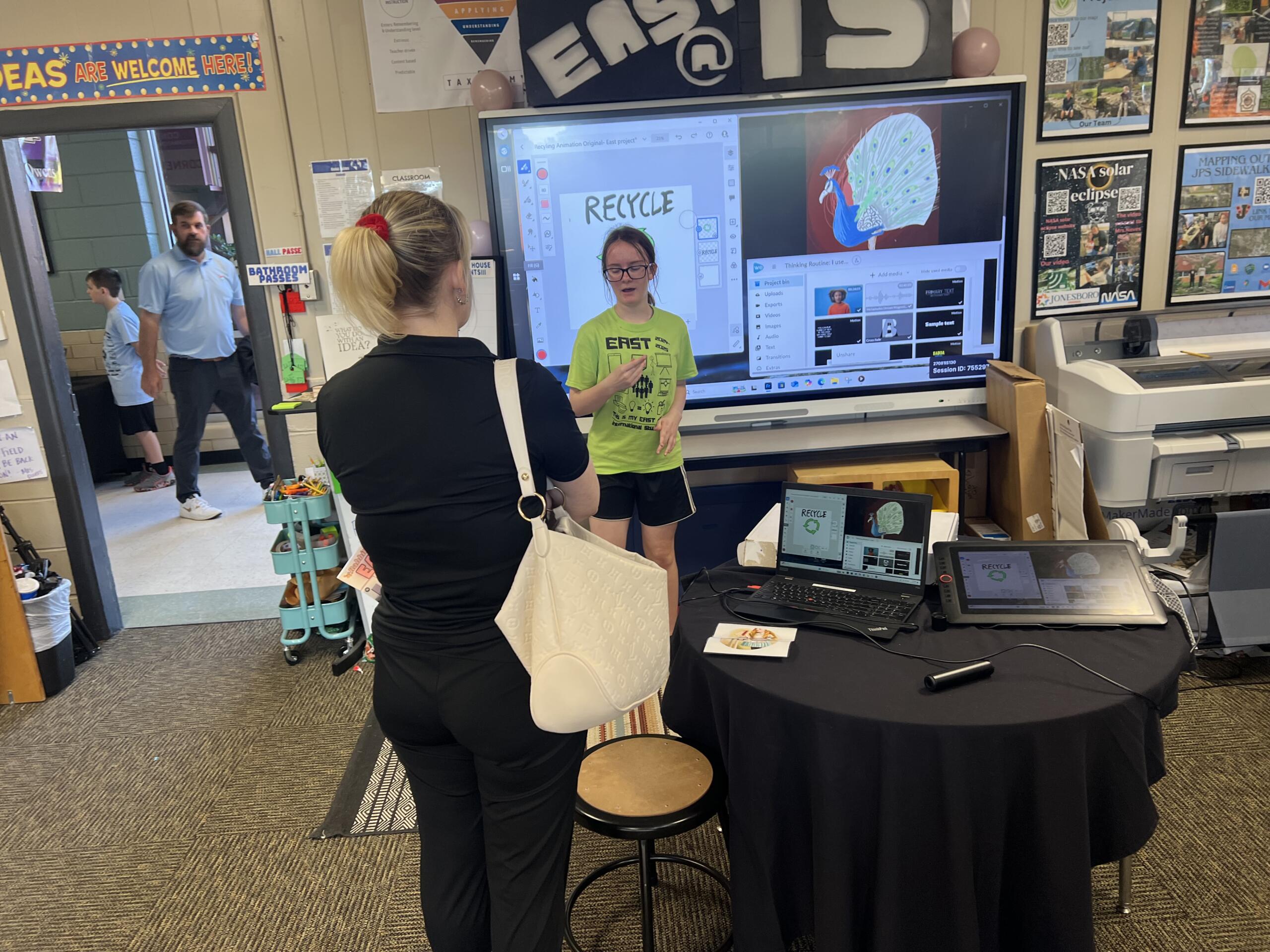 An EAST student presents her project.