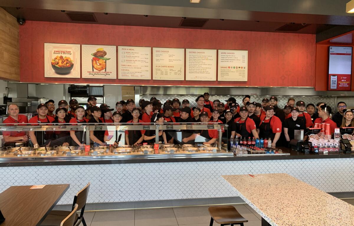Staff of Panda Express during the grand opening.