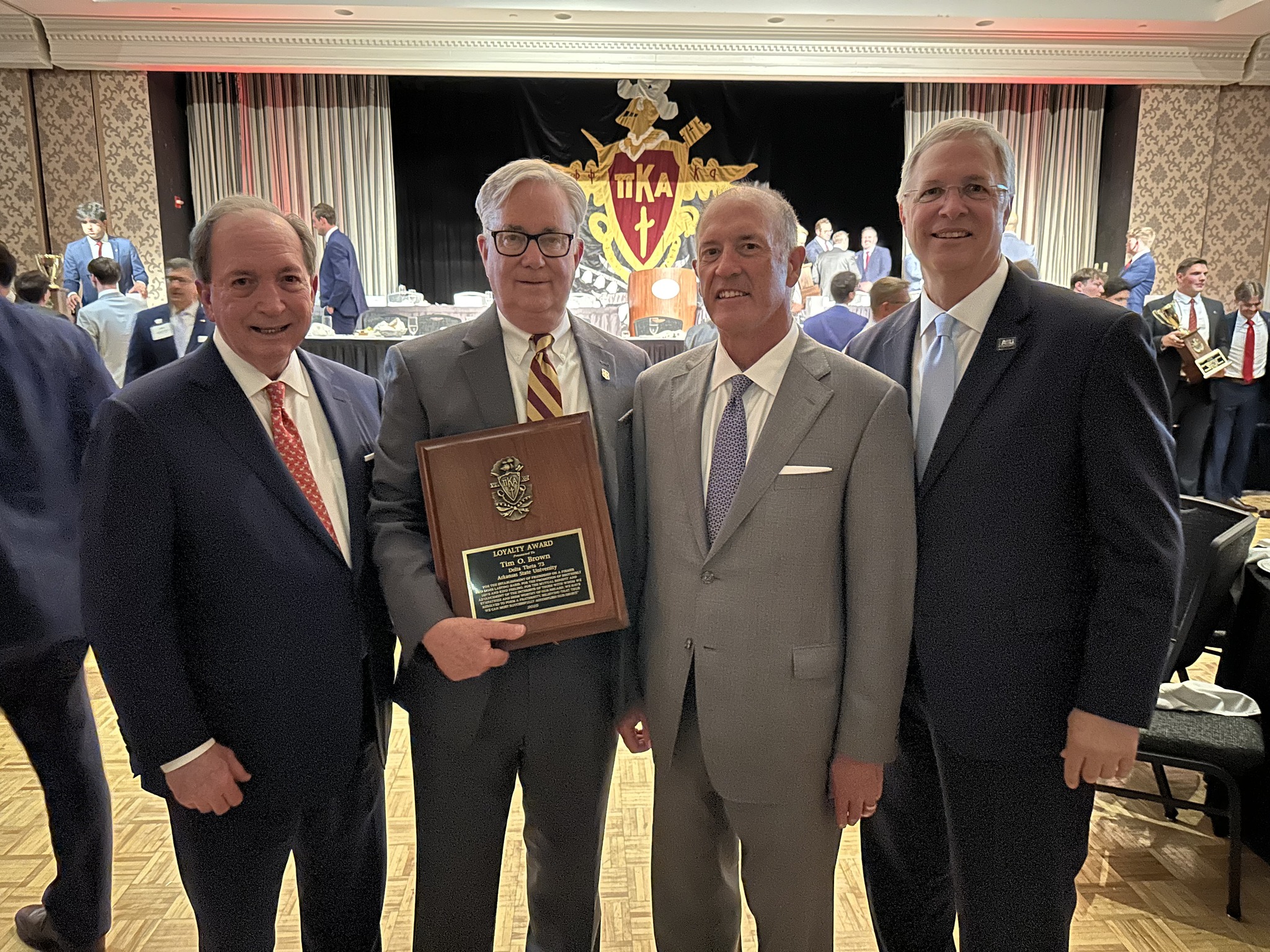 Tim O Brown presented Loyalty Award by national Pike Fraternity