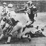 John Lorick and Robert Speer on a tackle for the 1975 undefeated Arkansas State Indians football team