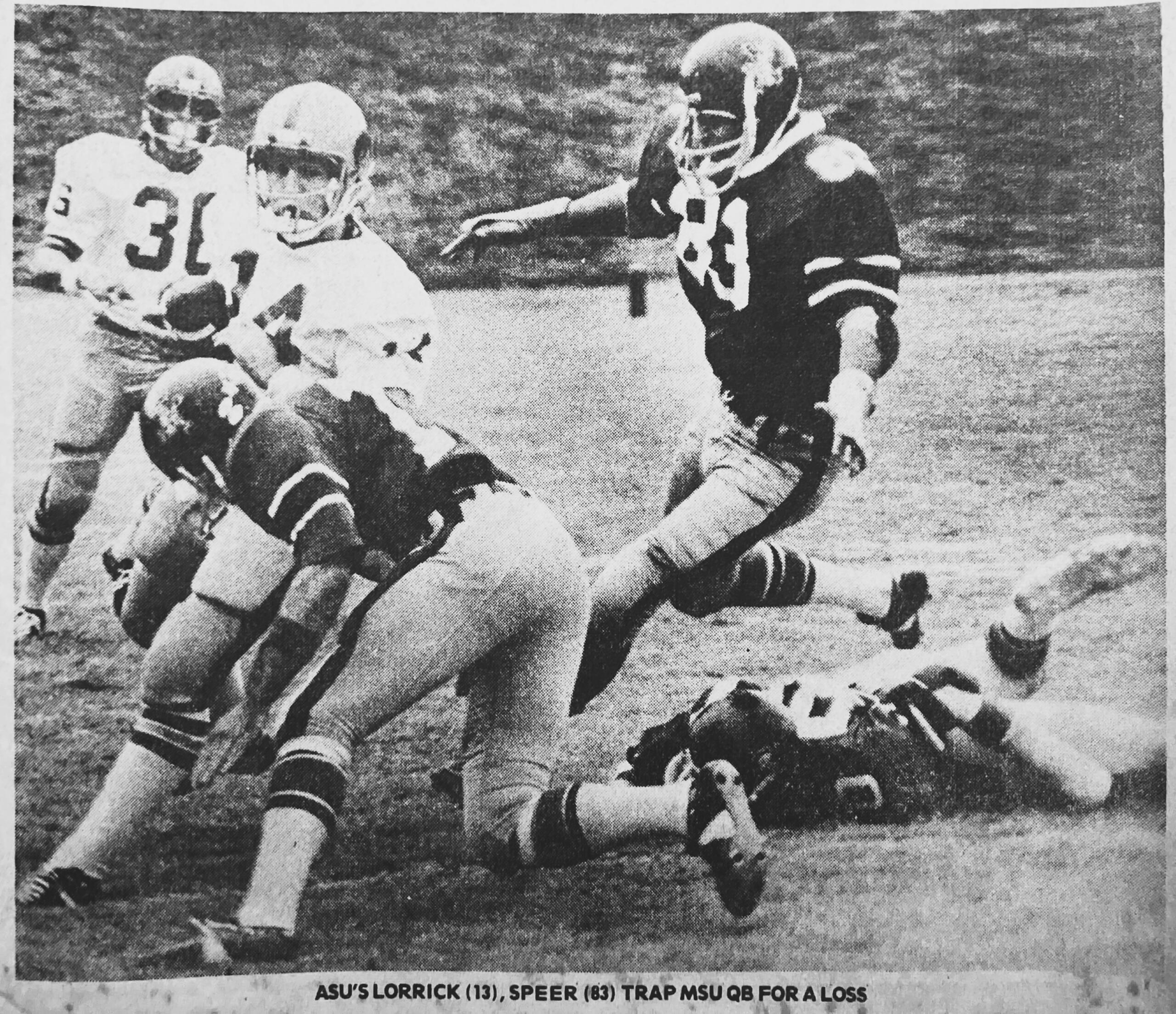 John Lorick and Robert Speer on a tackle for the 1975 undefeated Arkansas State Indians football team