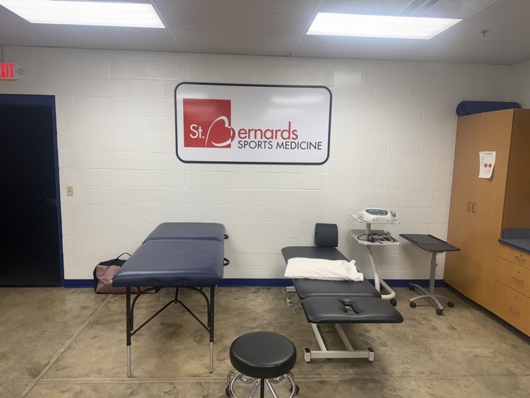 room showing medical tables and sign St. Bernards Sports Medicine