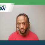mug shot of marshall irvin williams, man with dreadlocks and red shirt