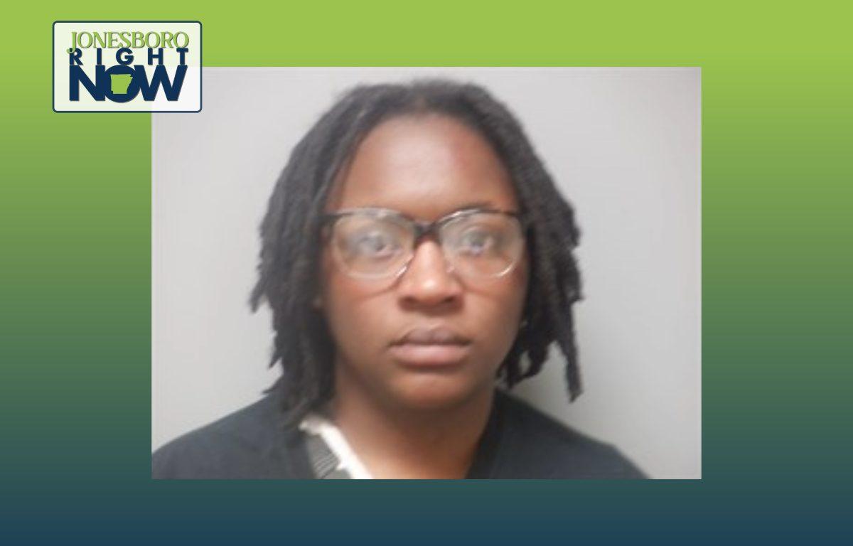 mug shot of african american woman with glasses