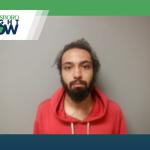 mug shot for trey haper, man with beard and mustach and red hoodie