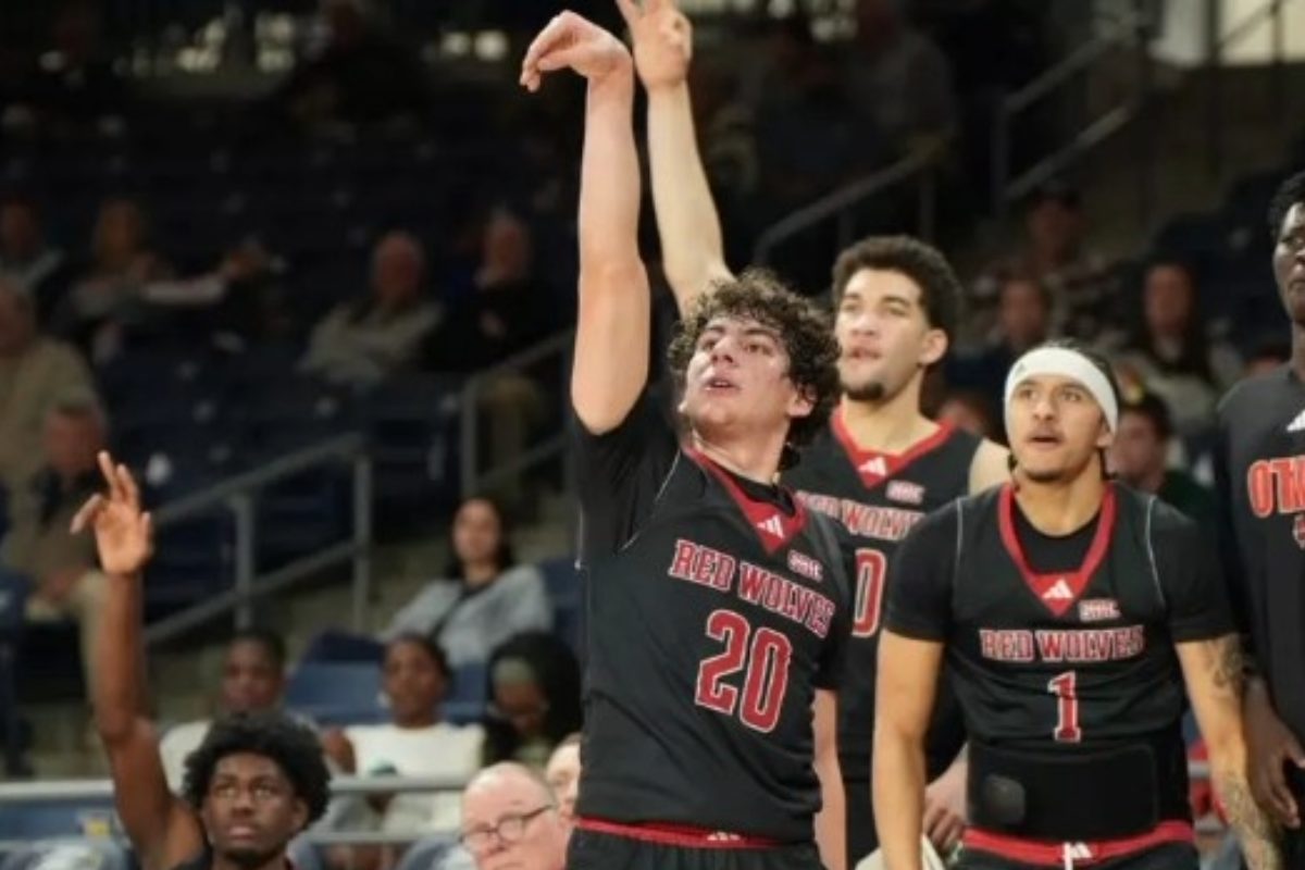 three basketball players