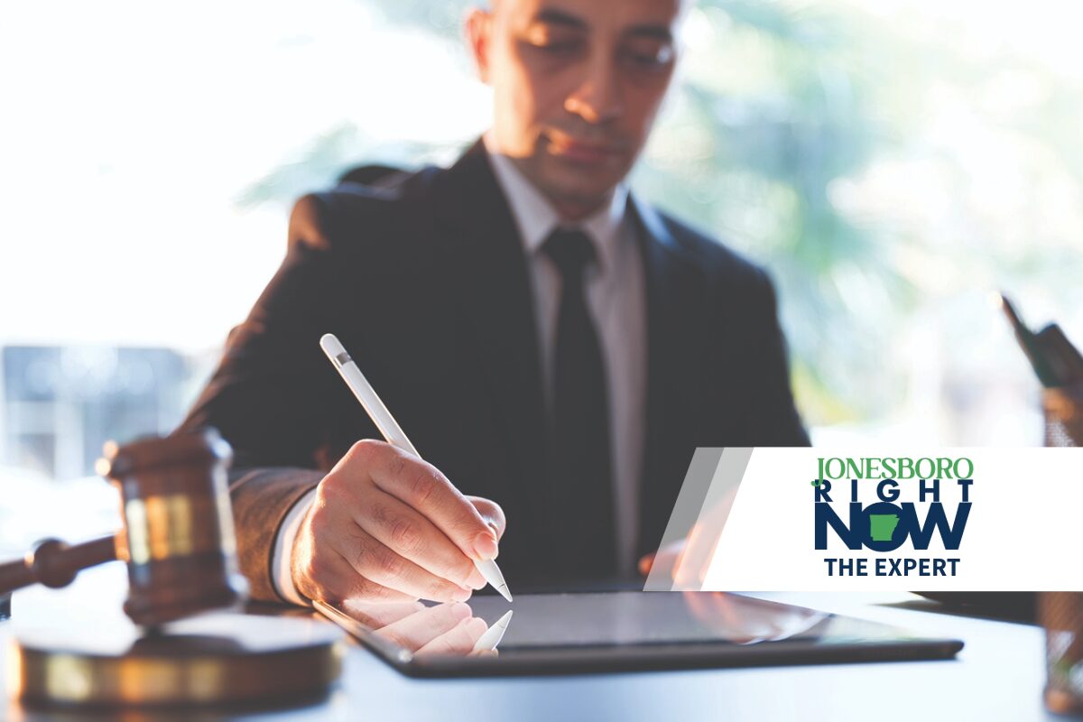 Attorney writingon ipad