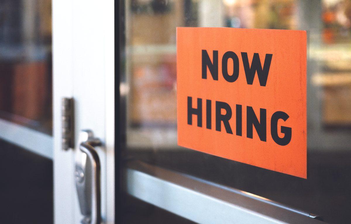 now hiring sign on door
