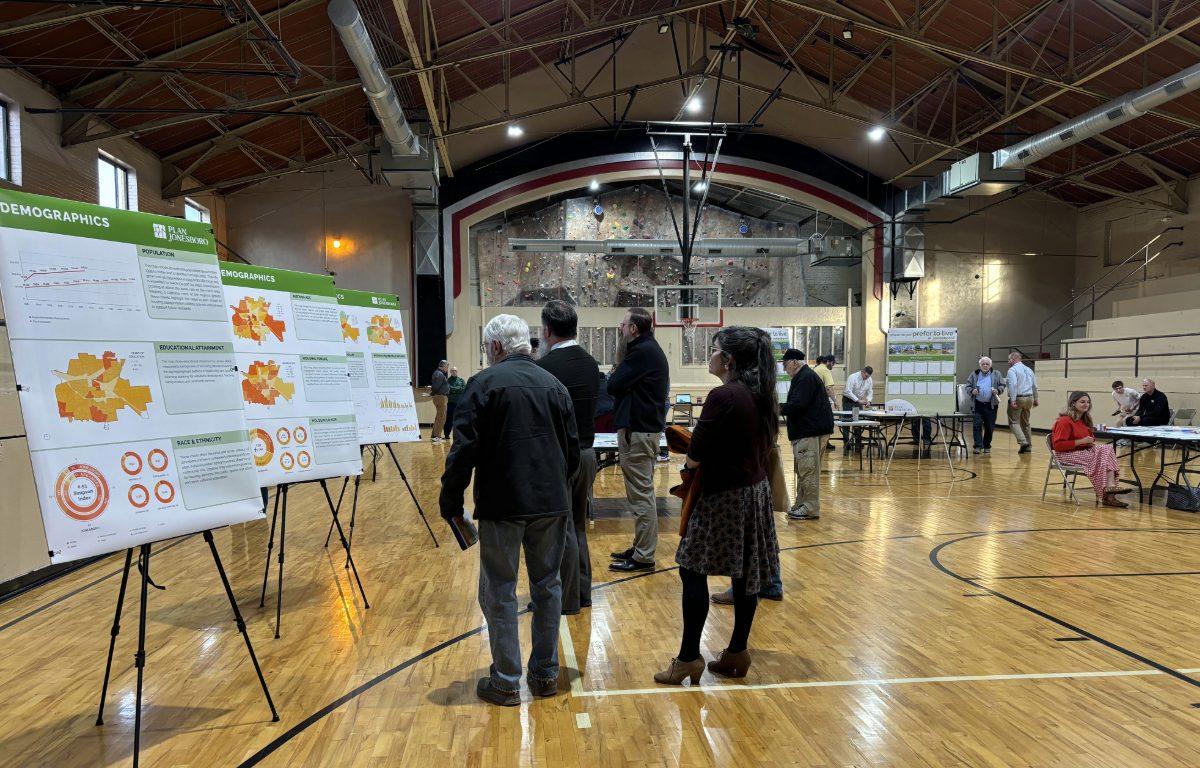 residents look at boards at earle belle community center for plan jonesboro