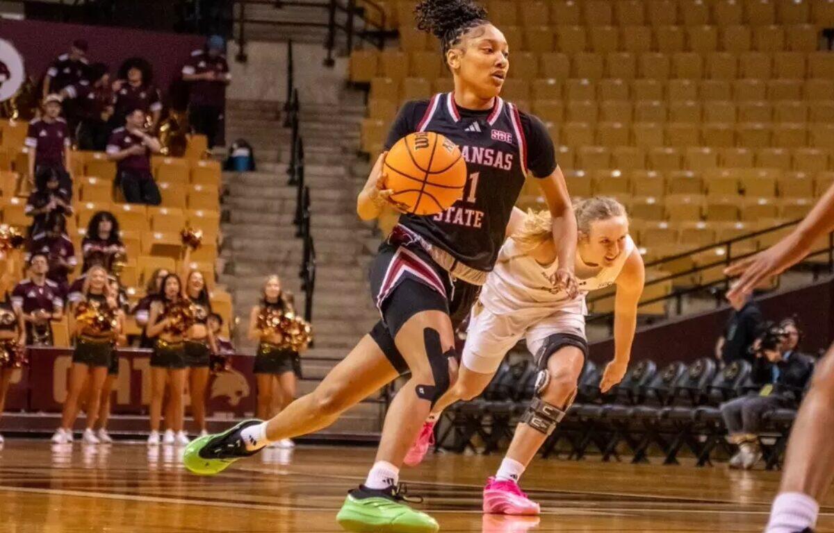 woman playing basketball in a-state uniform, player