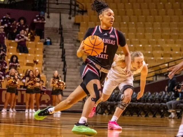 woman playing basketball in a-state uniform, player