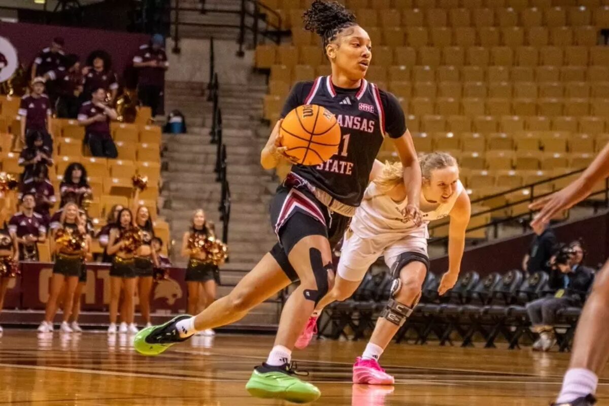 woman playing basketball in a-state uniform, player