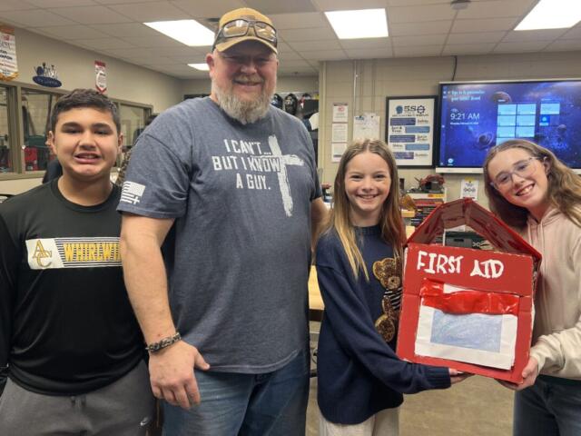 Jonesboro EAST students partner with NEACTC to build emergency playground medical boxes