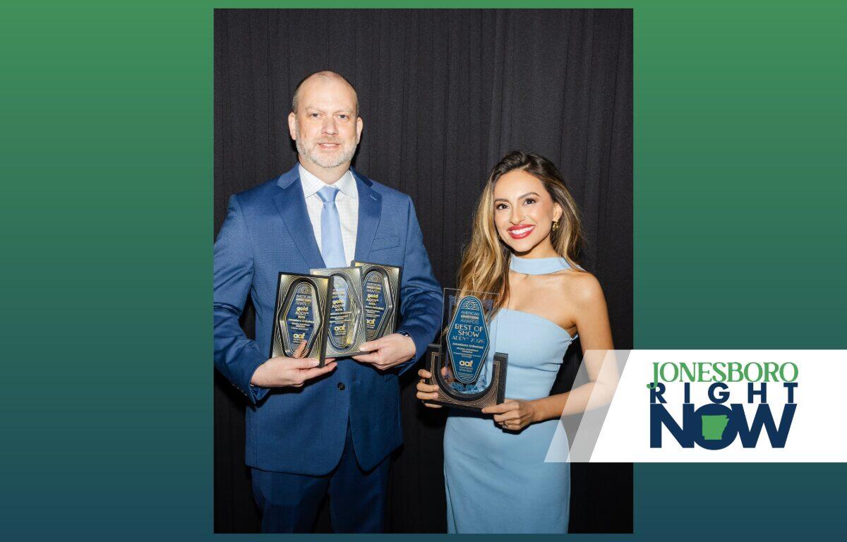 Jonesboro Unlimited Director of Communications Brandon Carter (left) and Director of Talent Attraction Bethania-Baray Harrison (right) with ADDY Awards.