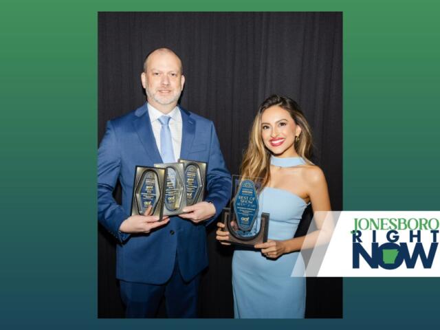 Jonesboro Unlimited Director of Communications Brandon Carter (left) and Director of Talent Attraction Bethania-Baray Harrison (right) with ADDY Awards.