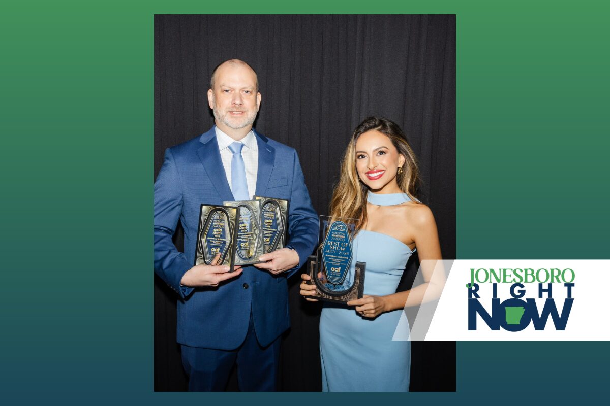 Jonesboro Unlimited Director of Communications Brandon Carter (left) and Director of Talent Attraction Bethania-Baray Harrison (right) with ADDY Awards.