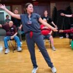 Occupational therapy student working with clients.