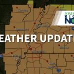 Regional weather map with brown shading, red pins marking cities (Jonesboro, Memphis, Blytheville) and the headline 'WEATHER UPDATES'; logo in top-right reading 'Jonesboro Right Now'.