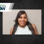 Smiling woman with long dark hair in a striped sleeveless top, head-and-shoulders portrait against a gray backdrop, with a Jonesboro Right Now banner in the corner.