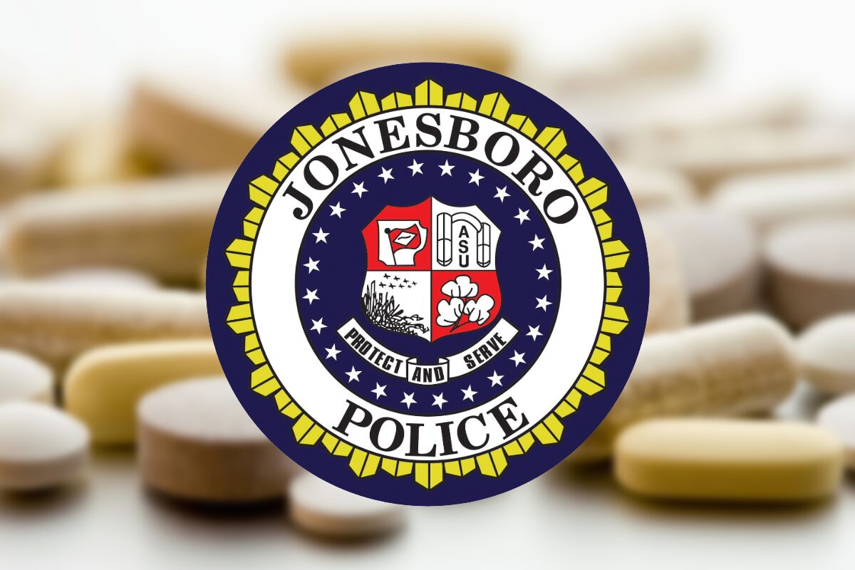 Jonesboro Police Department seal over a blurred background of scattered pills.