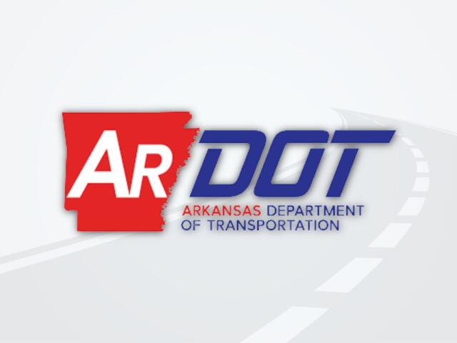 ARDOT logo featuring a red 'AR' block and blue 'DOT' lettering with the caption 'Arkansas Department of Transportation' and a curved road motif in the background.
