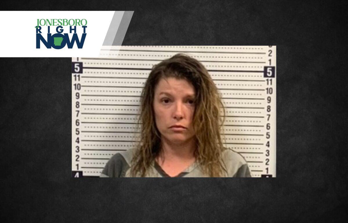 Mugshot of a woman in front of a height chart, with Jonesboro Right Now logo in the top left corner.