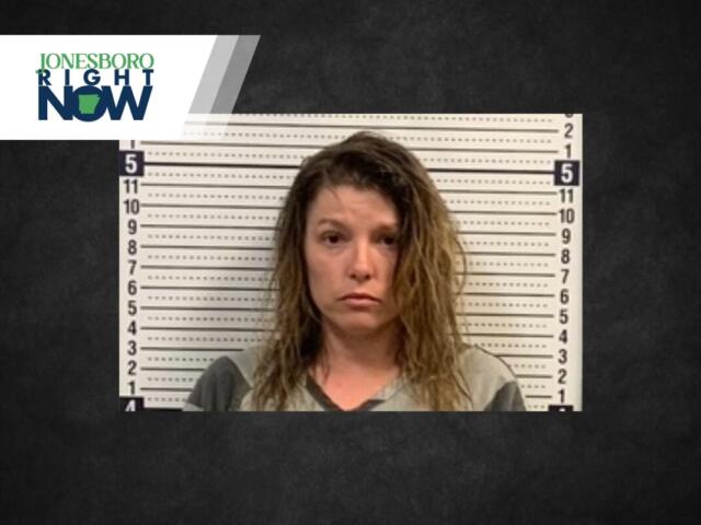 Mugshot of a woman in front of a height chart, with Jonesboro Right Now logo in the top left corner.