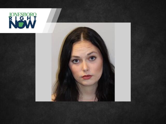 Portrait of a young woman with dark hair and neutral expression, light gray background, positioned within a gray frame and Jonesboro Right Now banner above left.