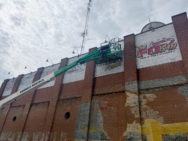 the north side of 314 union street with a scissor lift