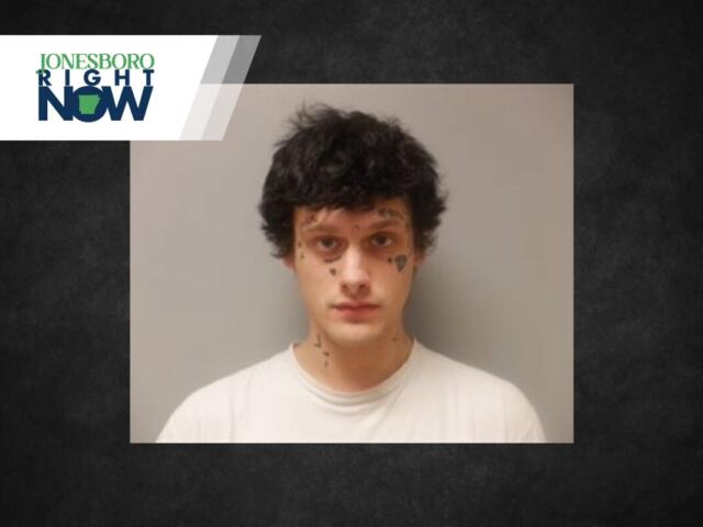 Mugshot-style photo of a young man with facial tattoos against a gray background, with a Jonesboro Right Now banner in the top-left corner.