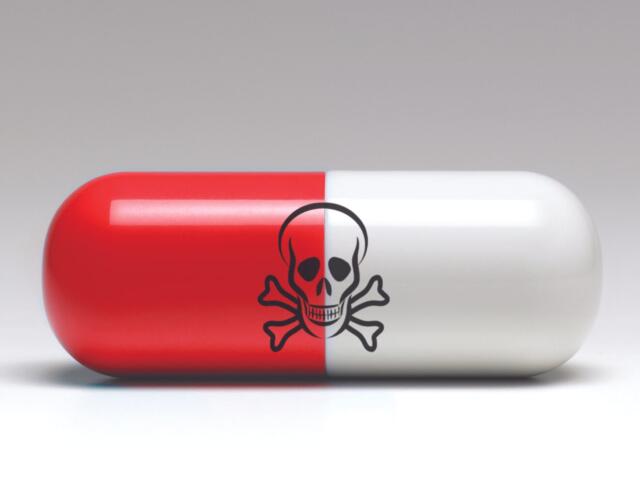 pill with skull and cross bones