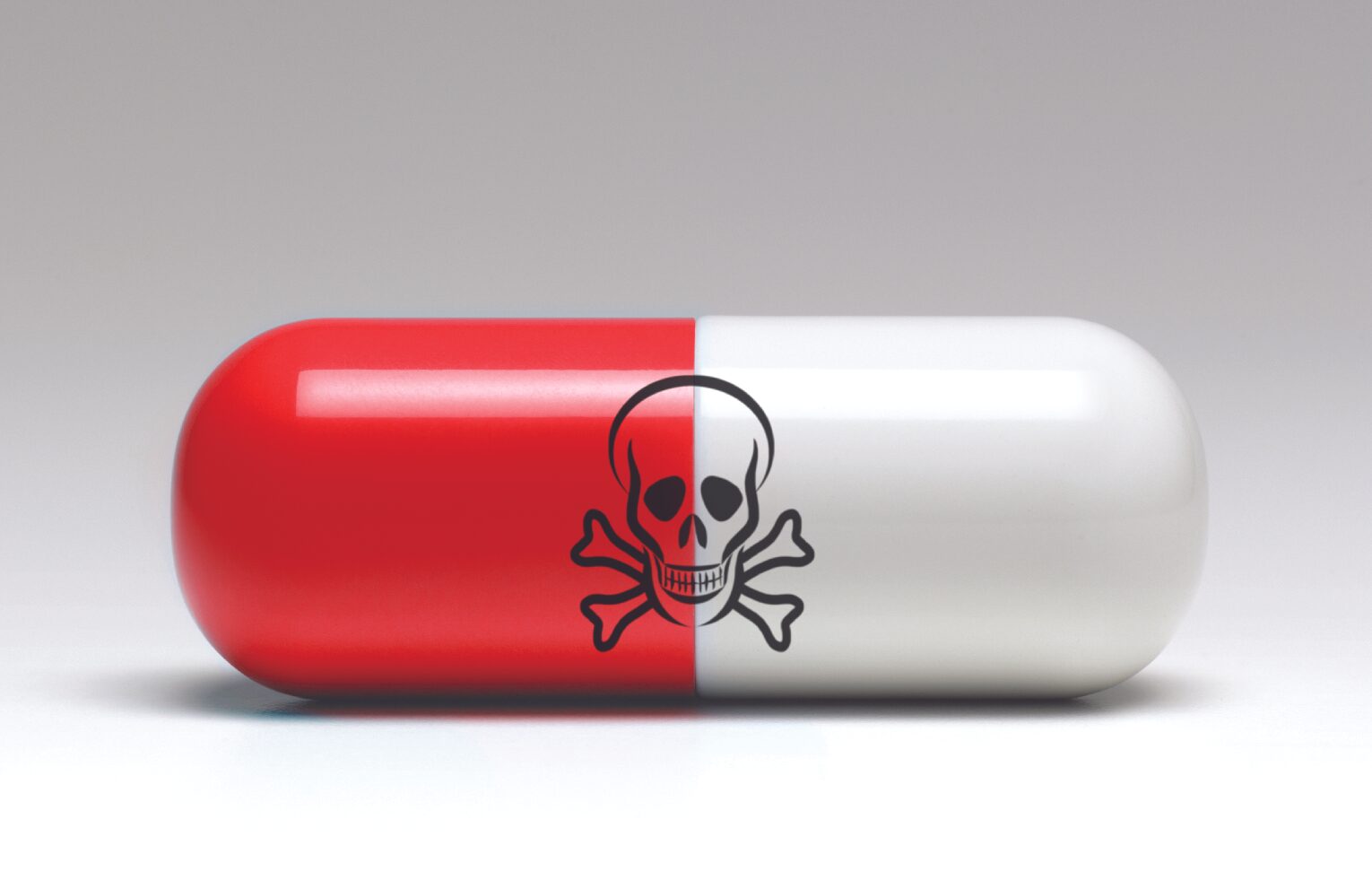pill with skull and cross bones