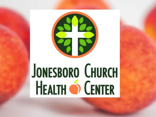 Jonesboro Church Health Center logo: white cross with green leaves inside an orange ring, with the organization name underneath.