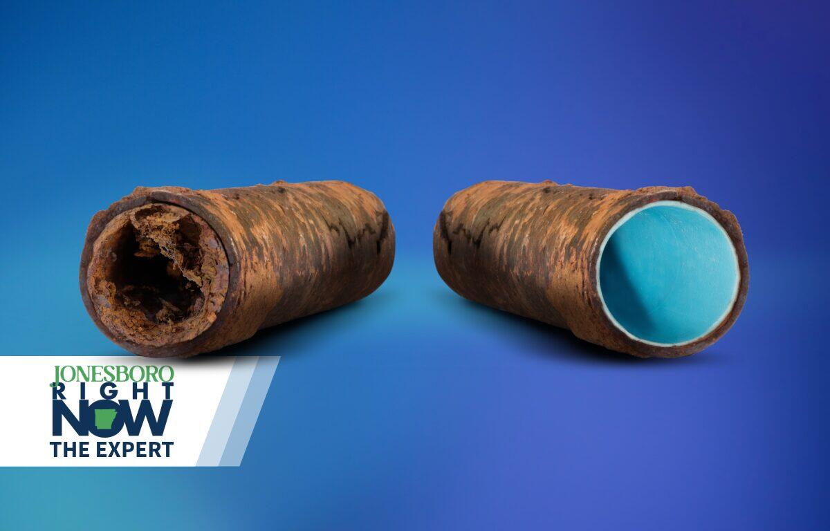 Two opened rusty pipes with blue interiors on a blue gradient background, with a 'Jonesboro Right Now The Expert' logo in the bottom-left corner.