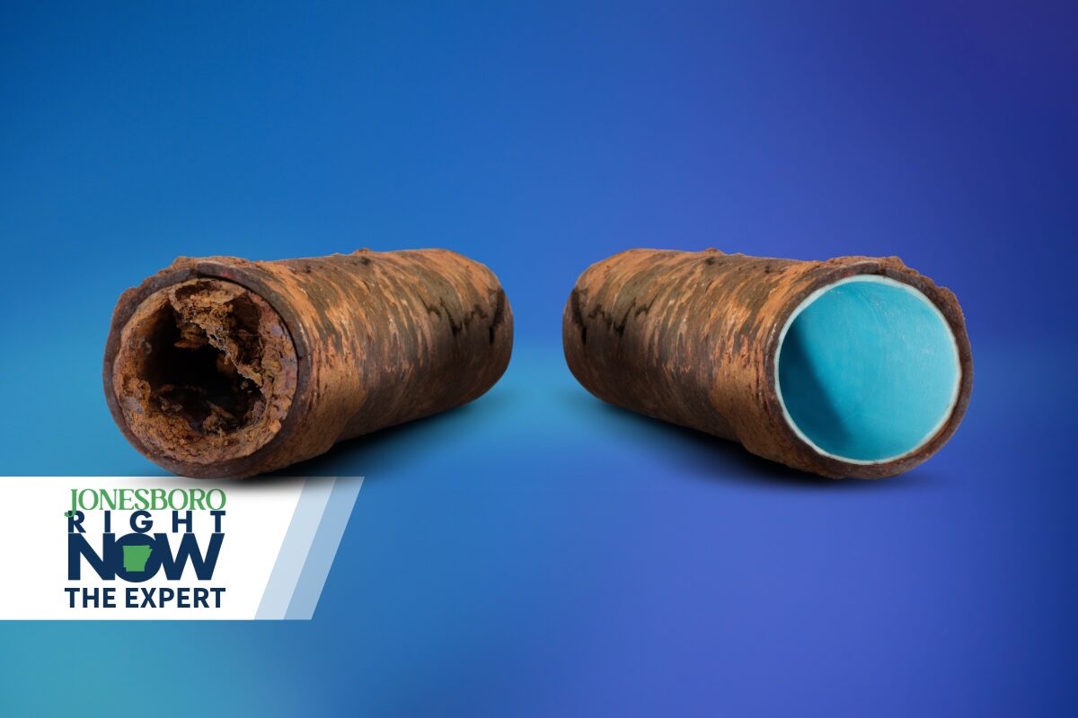 Two opened rusty pipes with blue interiors on a blue gradient background, with a 'Jonesboro Right Now The Expert' logo in the bottom-left corner.