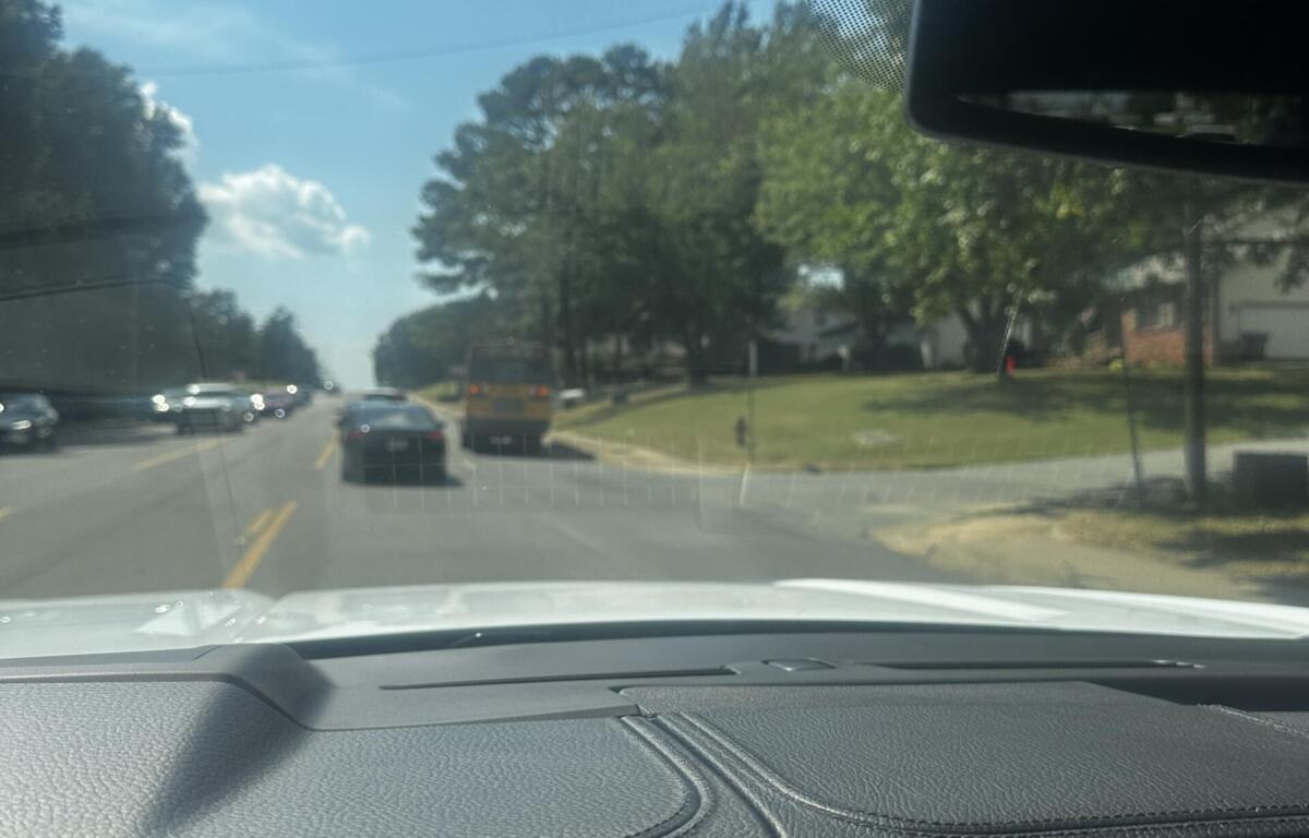 Shot behind bus on Highland Drive after crash